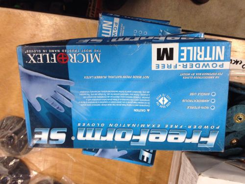 Microflex medium blue 9.5&#034; freeform se 3.9 mil nitrile gloves case of 4 boxes for sale