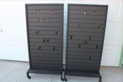 Used slatwall tower black display store fixture 2 sided rolling metal with hooks for sale