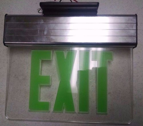 Surface Mount Edge Lit LED Exit Sign with Green on Clear Panel with Housing