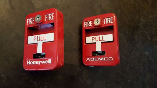 2 Ademco or Honeywell model 5140MPS-1 fire alarm system pull stations