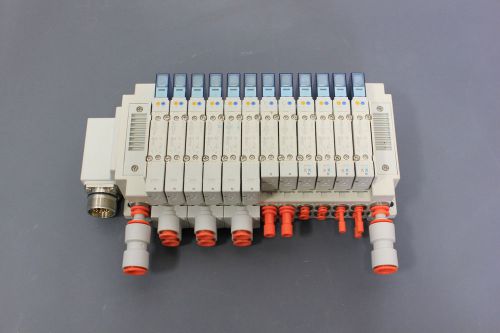 12 SMC 24V SOLENOID VALVES ON AN ELECTRONIC MANIFOLD SY5100-5U1 SY5400(S19-2-32I