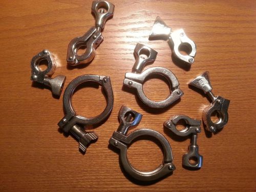 Used lot of 7 stainless steel sanitary clamps , 4 -1&#034; ,   1- 2&#034;   ,  2-21/2&#034; for sale