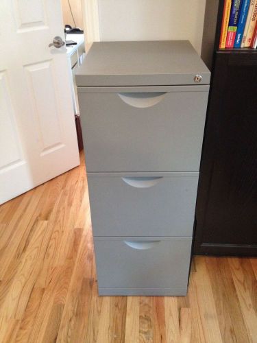 Gray Filing Cabinet (three shelves, with inserts for file folders)