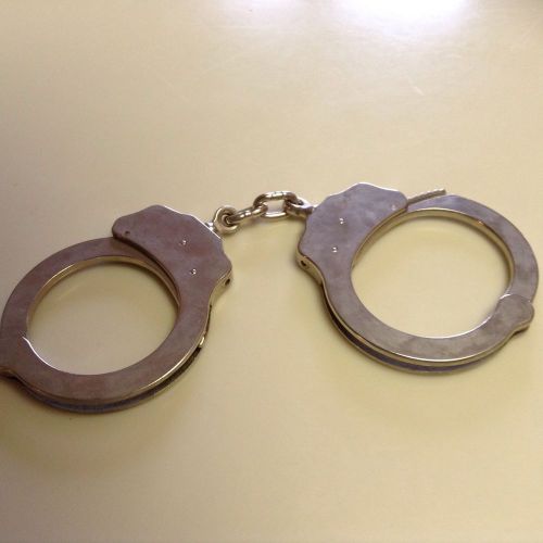 Vintage handcuffs peerless handcuff co. nickel plated with key 1531451-1672857 for sale