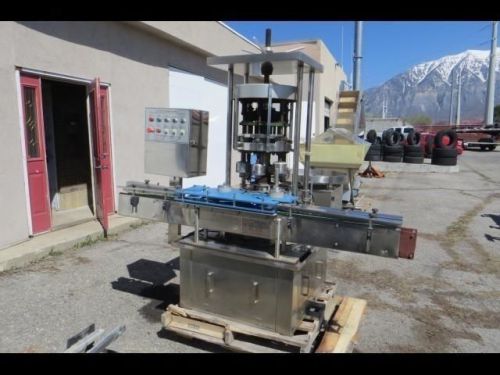 Fully automatic rotating caps tightening machine 6 spindle tom * repo for sale