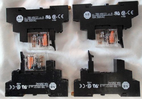 4 used allen bradley socket base w/ 3 24vdc relays din rail plc output control for sale