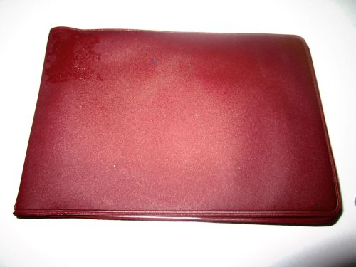 Red, flip open, pocket sized notepad