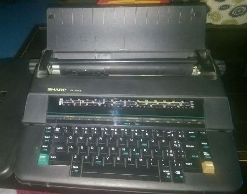 Sharp portable electric typewriter 3100 II