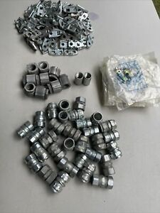 Lot of 159 1/2” conduit fitting, clamp back, 3 piece coupl, Erickson, unistrut