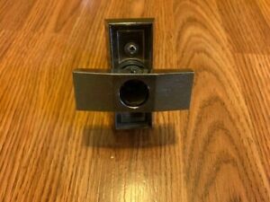 LOCK MECHANISM FOR A VENDING MACHINE