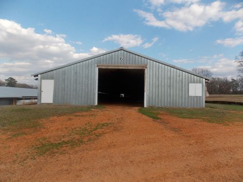 100 x 42&#039; Pole Barn, Complete with ends side doors and Roll Seal door