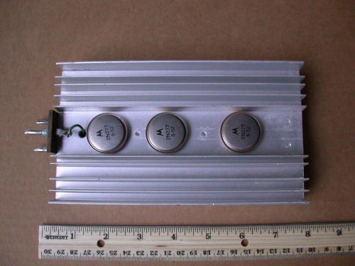 Aluminum heat sink with three 2N277 PNP Germanium TO-36 transistors
