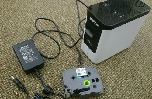 Brother P touch 700 PT-P700. label maker, printer with an AC adapter and tape.