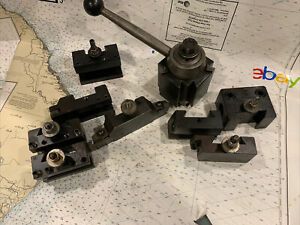 Aloris CXA Quick Change Wedge tool post and 8 holders.