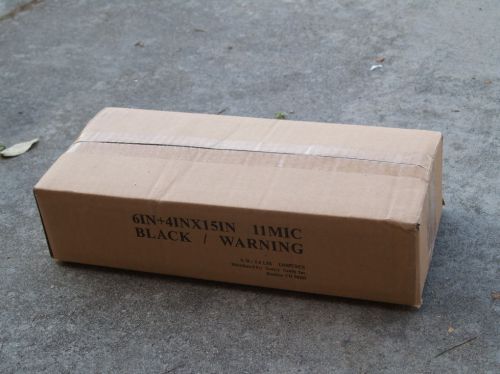 1300 Pcs 6x4x15in. Black/Warning Plastic T-Shirt Bag