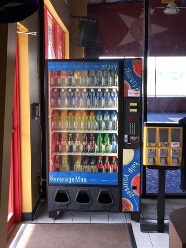 Dixie Narco Bev Max glass front drink vending machine
