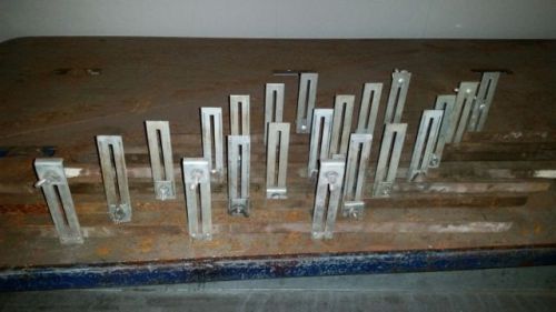 7 Foley Saw Carriers and 1 Ratchet Bar