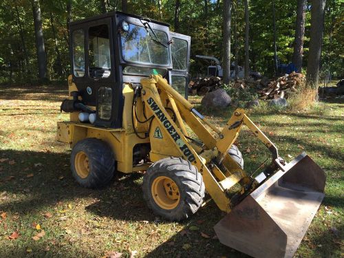 Used Swinger 100 Articulating Loader, w/ Multiple Attachments - Grapple