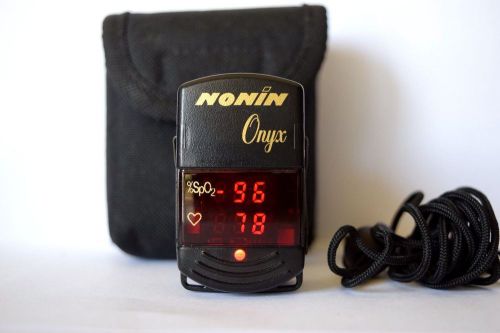 Nonin Onyx Monitor Model 9500 with Lanyard , Case and fresh batteries .
