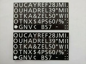 Quartet 1/2&#034; Flat Magnetic Letters. White Letters on Black Background.