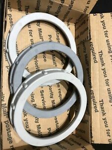 Lot Of (3).     4”   plastic insulation bushings