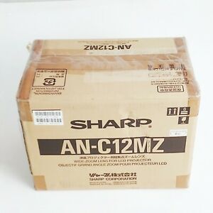 New in Box Genuine OEM SHARP AN-C12MZ Wide-Zoom Lens for LCD Projector