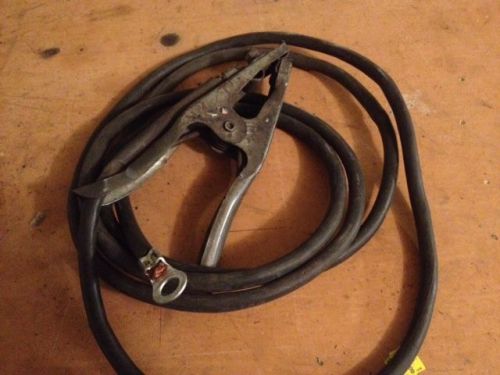 Welding ground cable with clamp