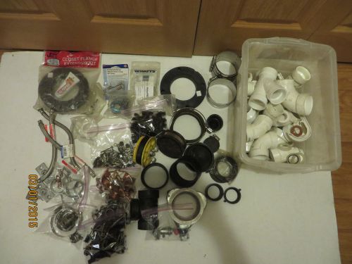 Mixed lot plumbing supplies pvc fittings rubber caps stoppers hangers, straps for sale