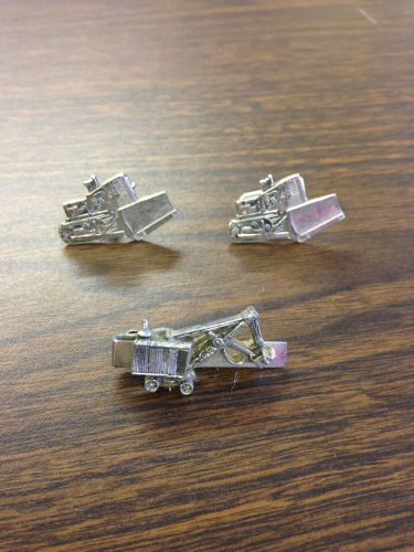 Vintage leavens bull dozer cuff links and tie clip for sale