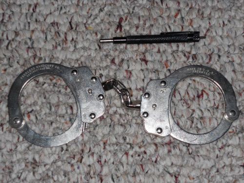 Peerless model 700 nickel finish handcuffs with key. for sale
