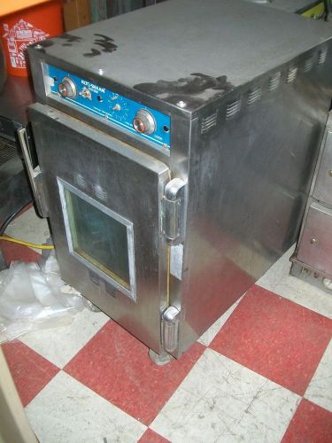 ALTO SHAM 1/3 SIZE COOK AND HOLD OVEN, 115V, CASTERS, S/S. 900 ITEMS ON E BAY