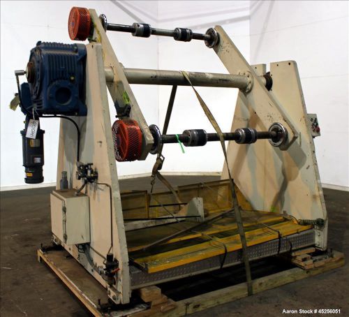 Used- Dri-Tec Single Turret Dual Station Winder. Approximate 52&#034; wide x 48&#034; diam