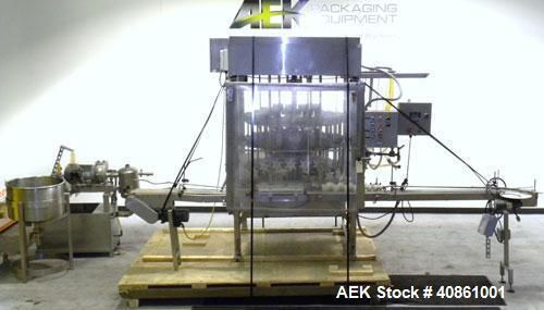 Used- Filling Equipment Company 24 Head Rotary Vacuum Filler. Capable of speeds