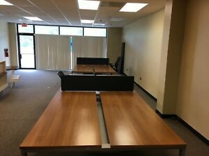 Set of two huge desks, 4 large desks, several drawers, with new dividers. 