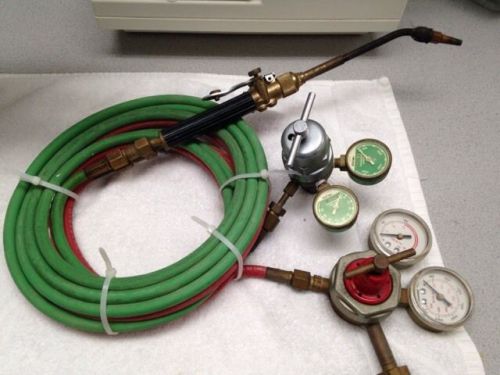 Harris torch with regulators and hoses for sale