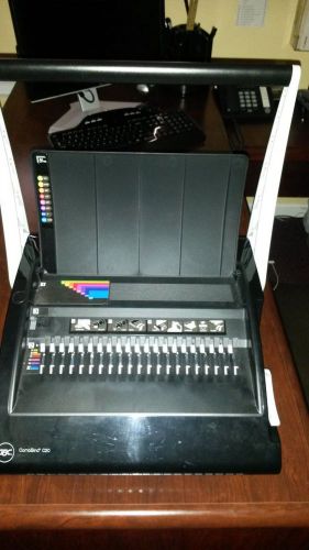 GBC CombBind C20 Binding System with a box of binders:  Used Once