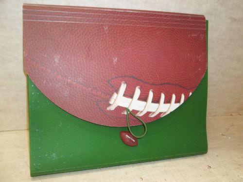 A nice Docit #701 file folder with a football looking cover