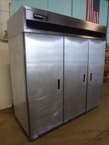 Commercial heavy duty &#034; delfield &#034; stainless steel 3 doors refrigerator w/caster for sale