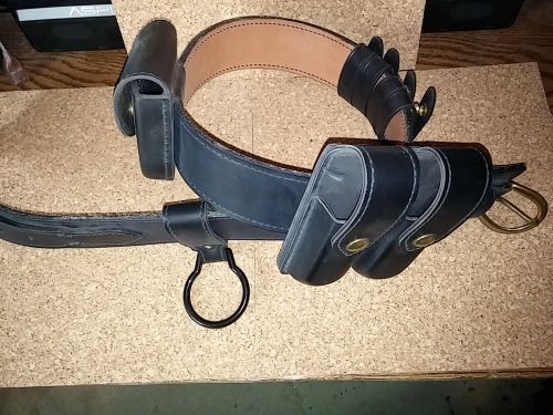 Black leather Safariland duty belt w handcuff, etc.