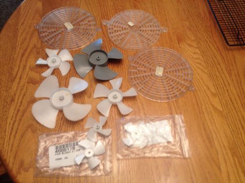 7 Plastic Fan Blades and 3 Plastic Fan Guards