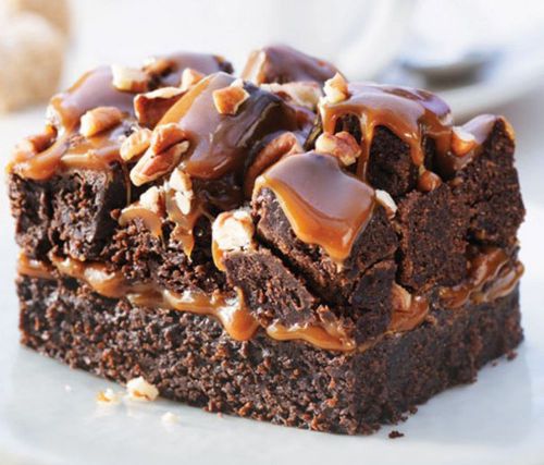 Chocolate brownie cake with pecan and caramel syrup