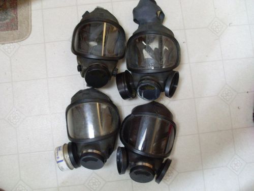 Four Used Gas Masks Two DEF TEC and Two MSA Police Surplus Size Med Prepper Gear