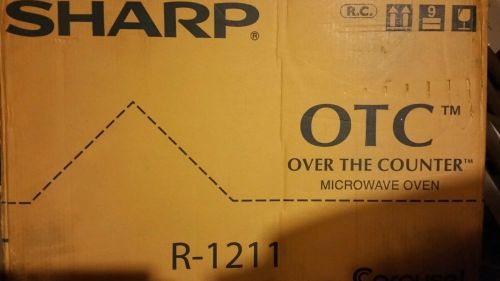 Sharp R-1211 1100 Watts Microwave Oven