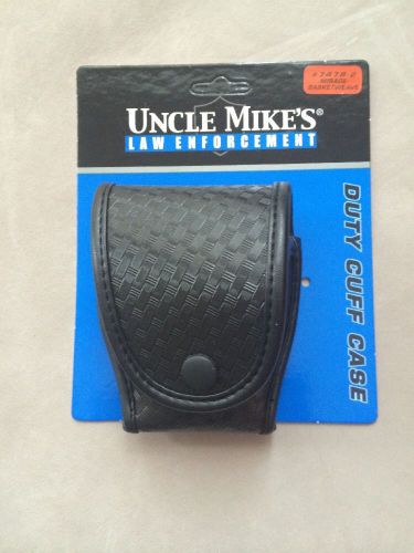 Uncle Mike&#039;s 74782 Black Mirage Basketweave Standard Duty HandCuff Case w/ Flap