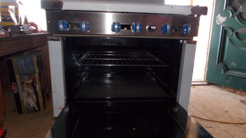 Silver commercial/restaurant gas range &#034;royal&#034; stainless 6 burner, large oven. for sale
