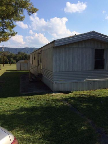 2000 Clayton Mobile home. Rental Income. Currently rented.