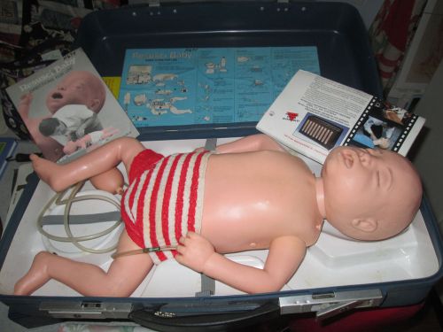 LAERDAL RESUSCI BABY FIRST AID CPR TRAINER MANIKIN WHITE GOOD CONDITION &amp; CASE