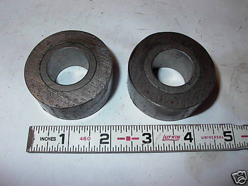 LOT OF TWO STEEL ROUND BUSHING