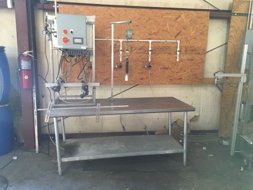 Fgt-4000 2 head tabletop gravity filler for sale