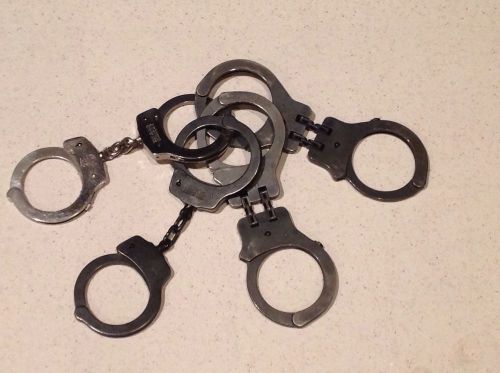 (2) Smith and Wesson Handcuffs (2) Peerless Handcuffs Made in USA